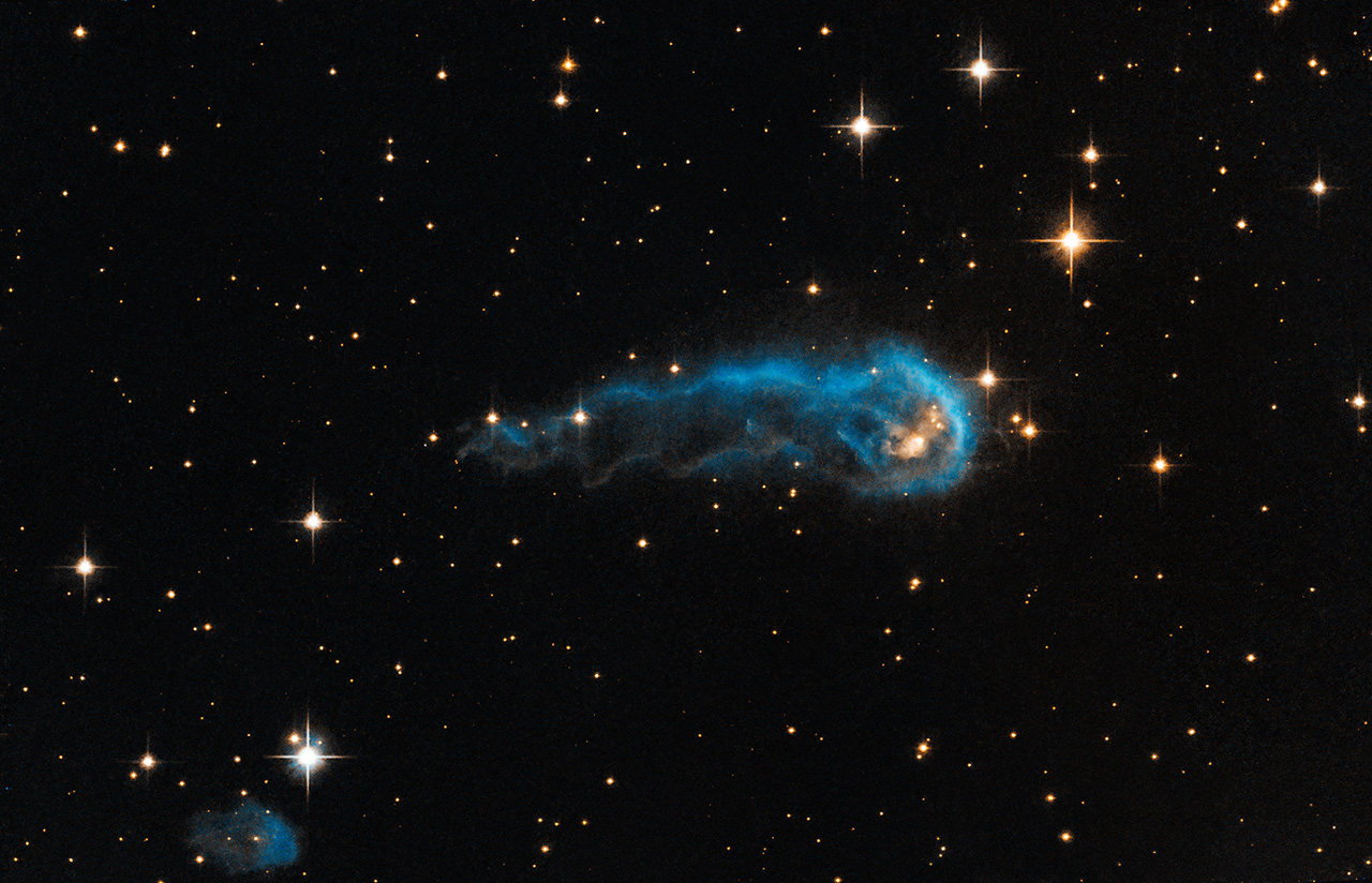 image of a growing protostar collecting material from the surrounding gas. Image taken by Hubble Space Telescope 
