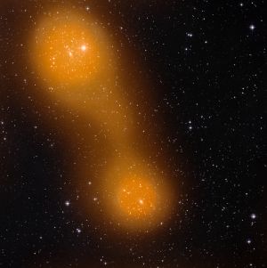 To galaksehoper bundet sammen med gass-sky