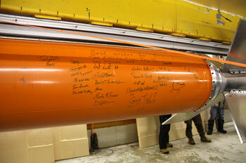 The crew signed the rocket before setting it off into the sky