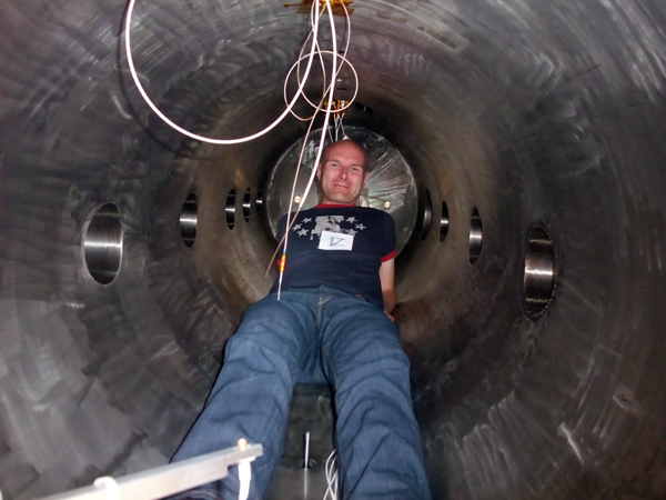 Preparing connections inside plasma chamber.