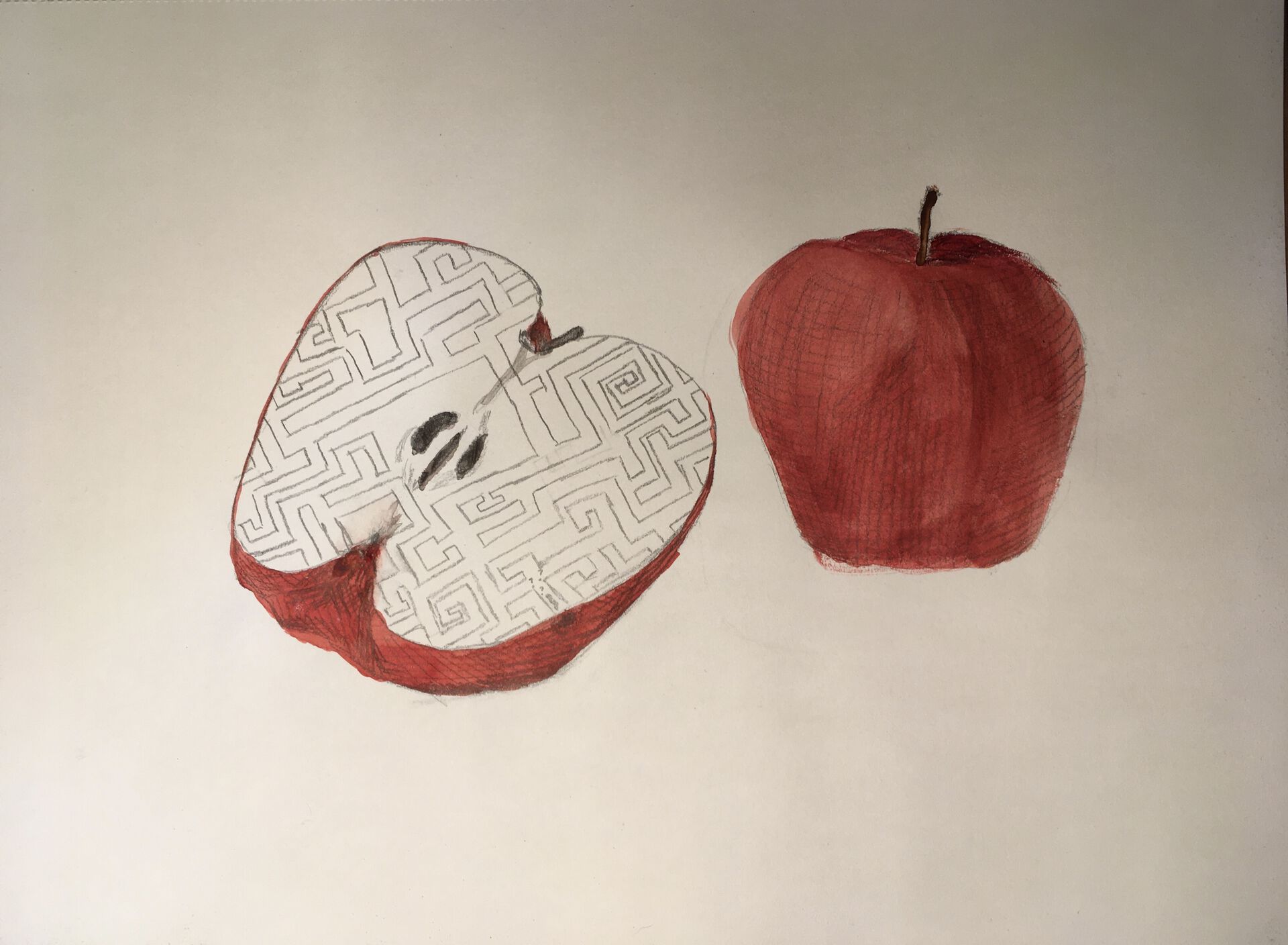 Tegnet bilde av et eple. 