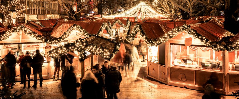 Christmas market in Kiel at night with bright lights