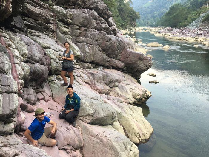 Three researches doing paleomagnetic fieldwork in Yangjiaping, South China